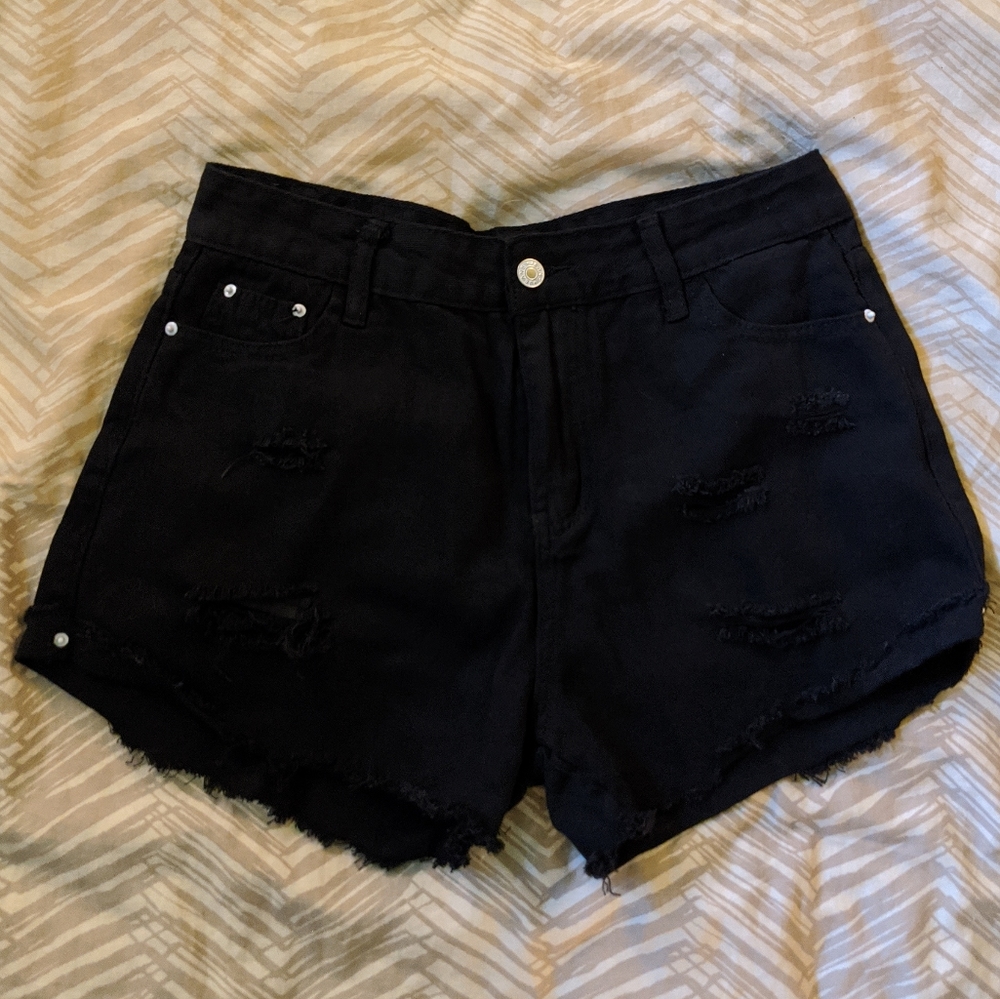 Black distressed jean shorts